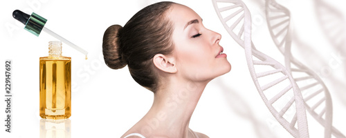 Cosmetic primer oil near beautiful woman with DNA chains.
