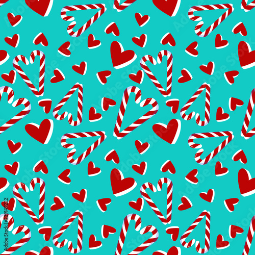 Christmas seamless pattern with candy cane and hearts .Holiday decoration perfect for wallpaper, posrcard, holiday packing, greeting.