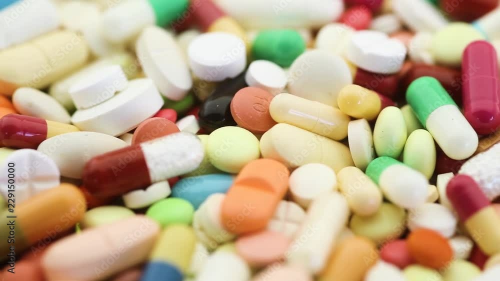 Seamless closeup loop of medication pills spinning Seamless closeup loop of medication pills spinning