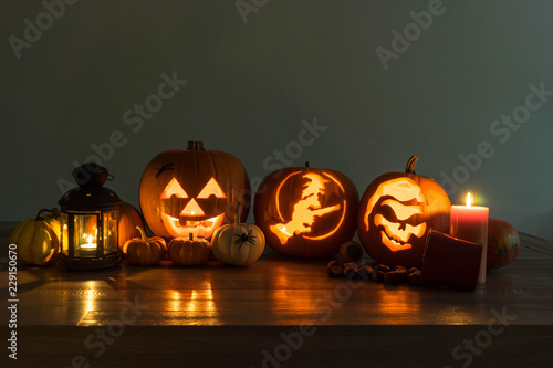 Halloween decorated pumpkins with candles and a lantern