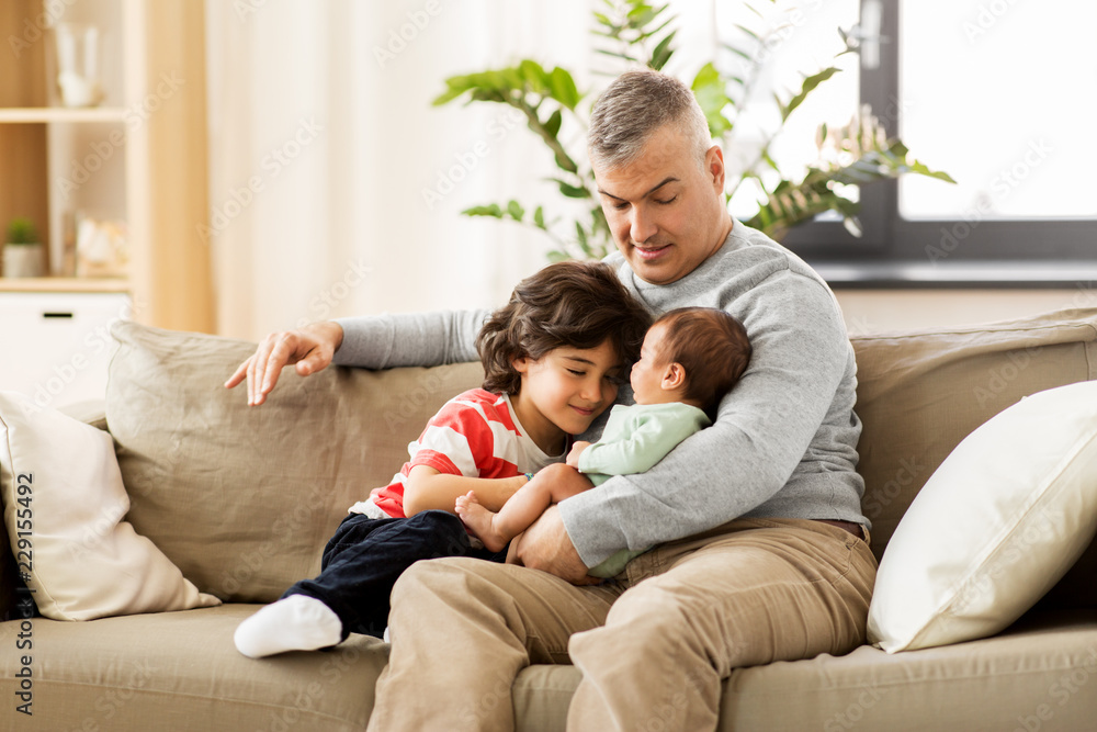 family, fatherhood and people concept - happy father with preteen and baby son at home family, fatherhood and people concept - happy father with preteen and baby son at home