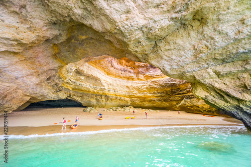 Tourist on kayaks in Benagil Cave, Algarve, Portugal