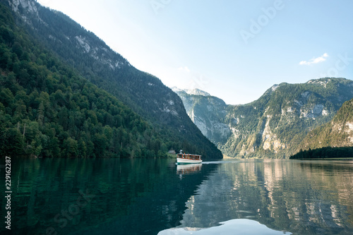 Stunning deep green waters of Konigssee, known as Germanys deepest and cleanest lake, located in the extreme southeast Berchtesgadener Land district of Bavaria, near the Austrian border.