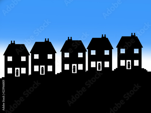 Five Houses Silhouetted against a blue sky © KDImages