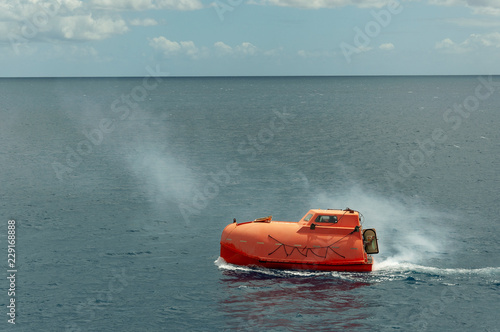 Free-fall life boat being tested at sea. © Vlad Ozo