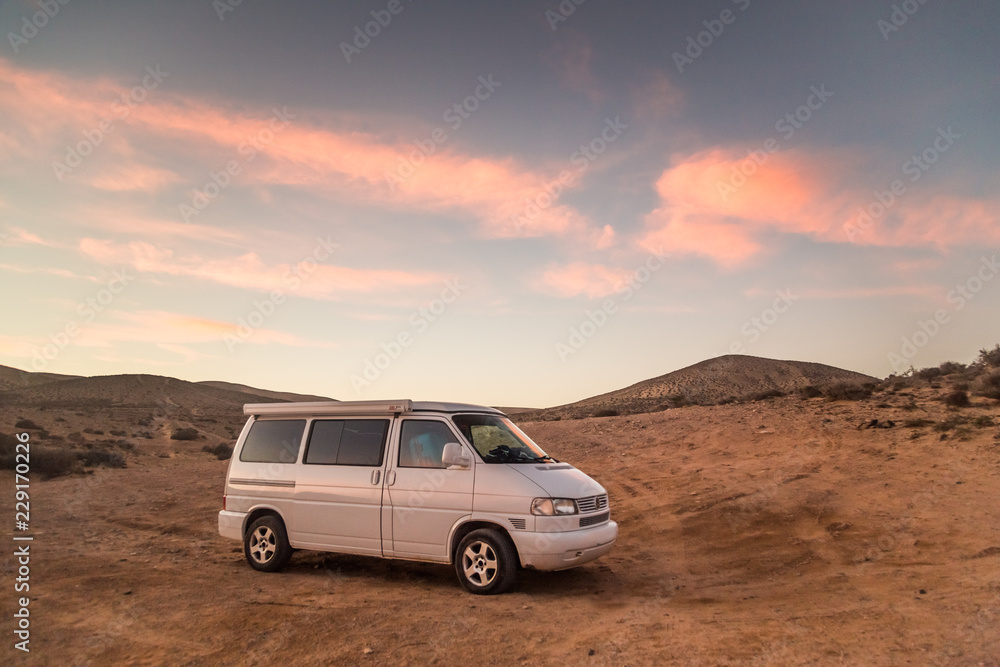 Family camper van parked on beach in Fuerteventura, Spain.