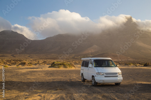 Camper van parked on Cofete beach in Fuerteventura. © paul prescott