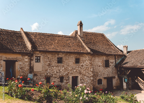 Ancient houses in the ancient fortress of Rasnov, Romania photo