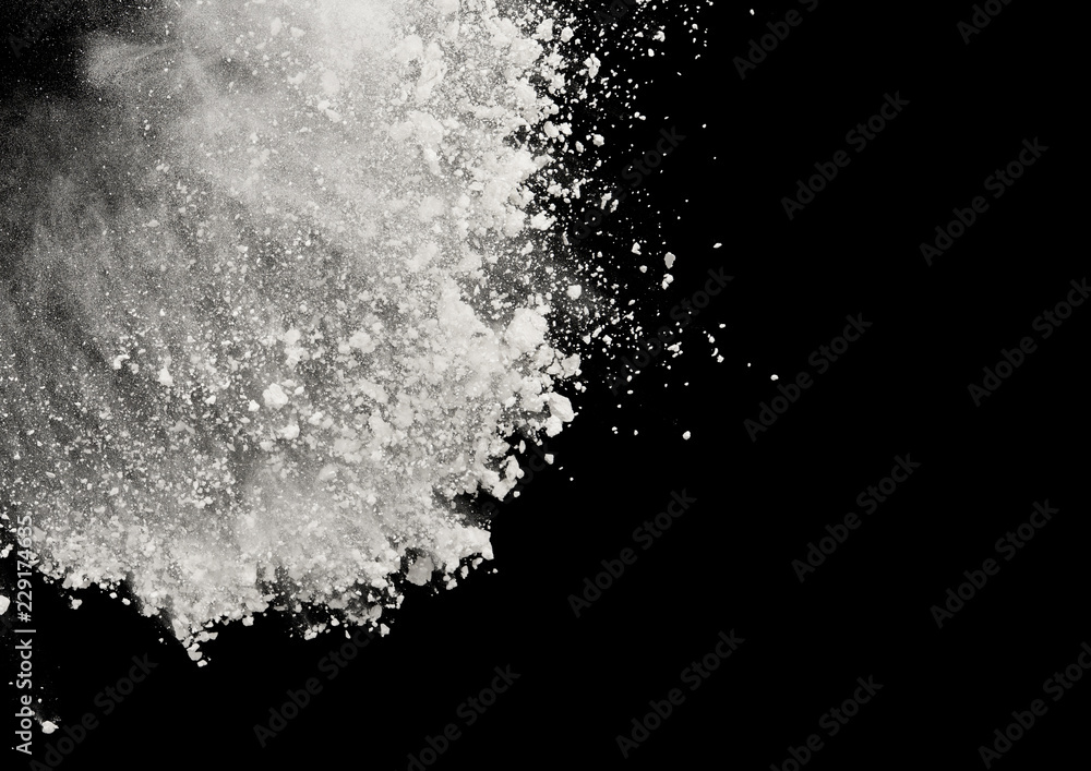 White powder or flour explosion isolated on black background freeze stop motion object design White powder or flour explosion isolated on black background freeze stop motion object design