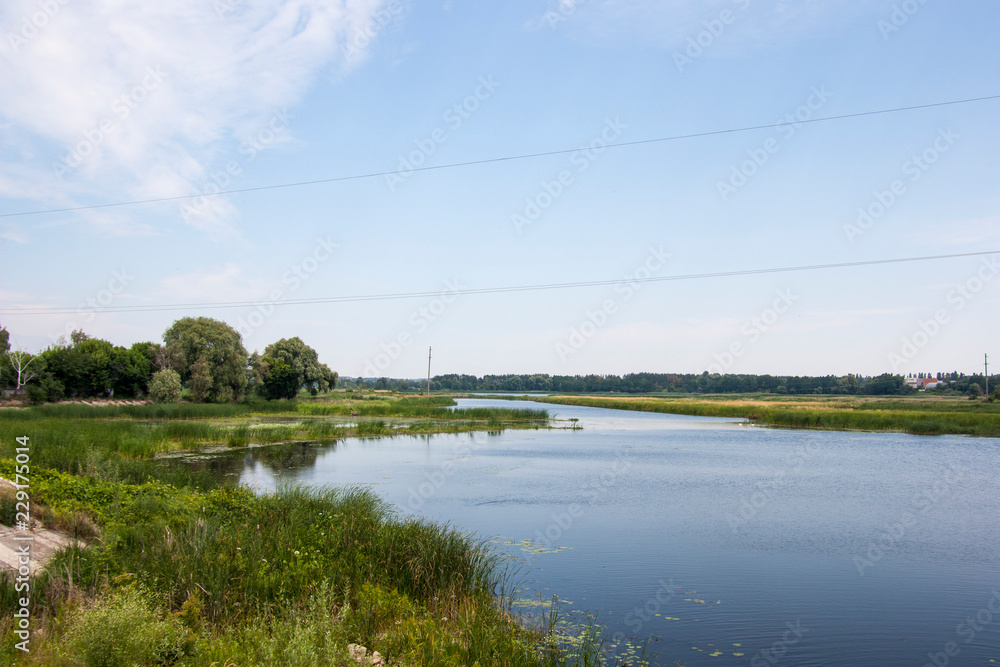 Obraz premium landscape with river and blue sky