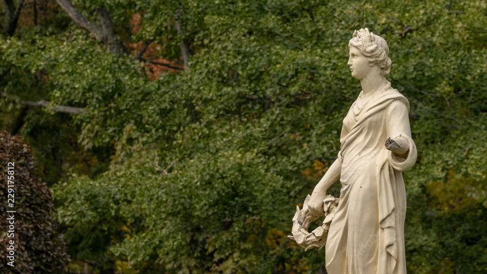 statue of woman in garden