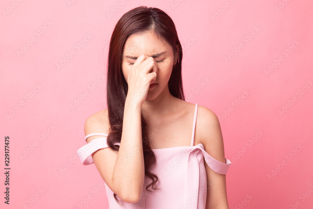 Young Asian woman got sick and headache. Young Asian woman got sick and headache.