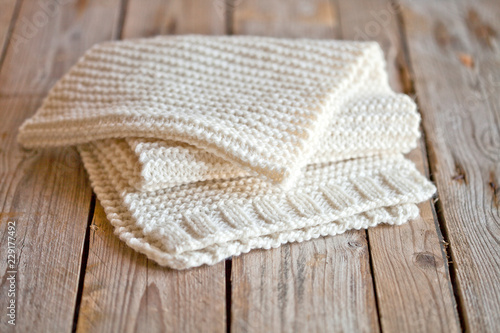 Hand knitted white scarf.