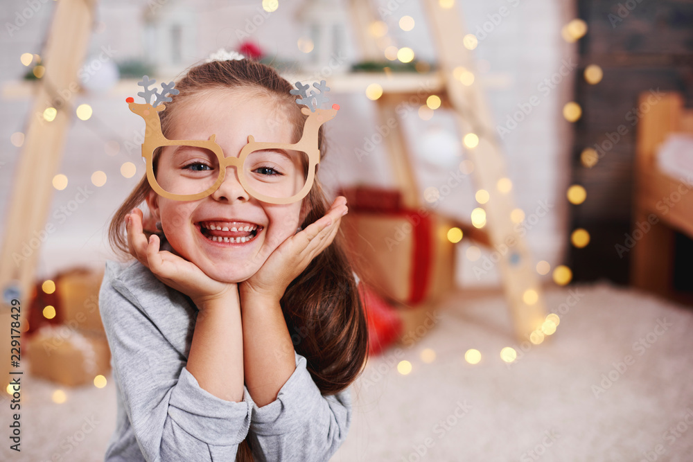 Portrait of adorable girl with funny glasses Stock Photo | Adobe Stock