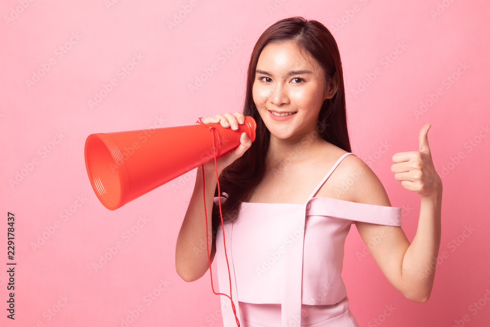 Beautiful young Asian woman announce with megaphone. Beautiful young Asian woman announce with megaphone.