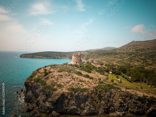  Landscape of beautiful sardinian coast with ancient tower