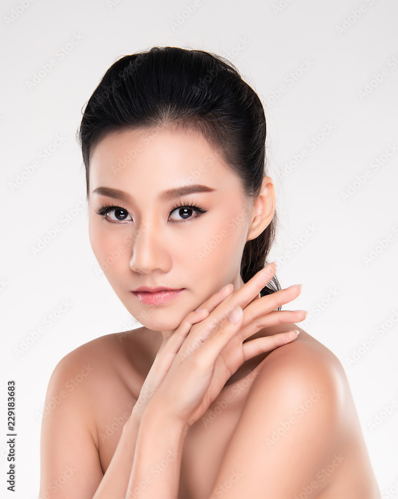 closeup young woman face with clean skin.