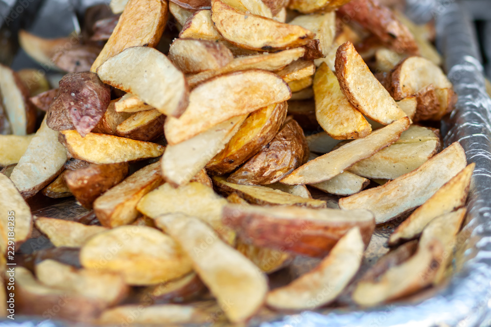 Potatoes sliced and baked in foil. Potatoes sliced and baked in foil.
