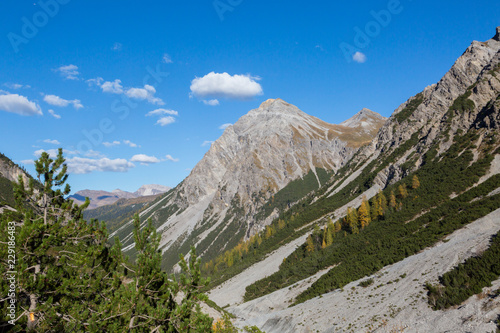 Schiesshorn mountain with clouds in blue sky, Welschtobel canyon