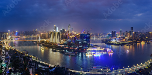 The nightscape of Chongqing Chaotianmen harbor where the Yangtze rive and Jialing river meet . © ZHIJIAN