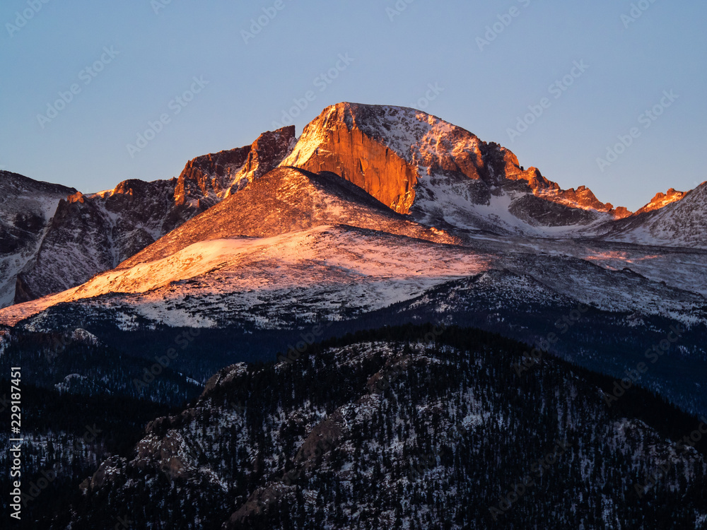 Longs Peak in the first rays of morning and with a light dusting of snow
