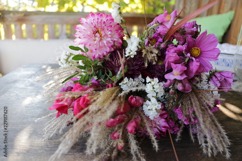 Bouquet of purple wild flowers on a Table