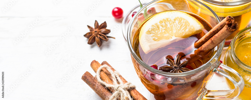 Autumn hot tea with lemon and spices Autumn hot tea with lemon and spices
