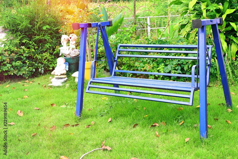 Bench swing in garden Bench swing in garden