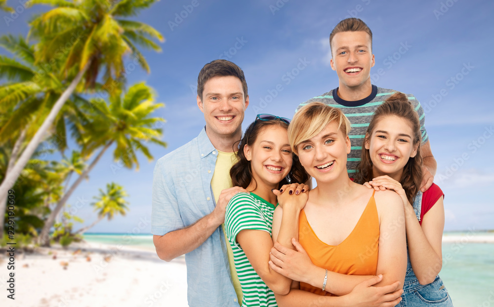 travel, tourism and vacation concept - group of happy smiling friends over tropical beach background in french polynesia travel, tourism and vacation concept - group of happy smiling friends over tropical beach background in french polynesia