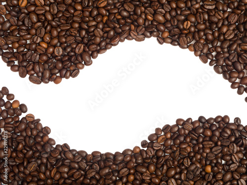 Isolated coffee beans arranged in curve lines shape at the top and bottom of the page. Background and texture. Copyspace, top, flat lay
