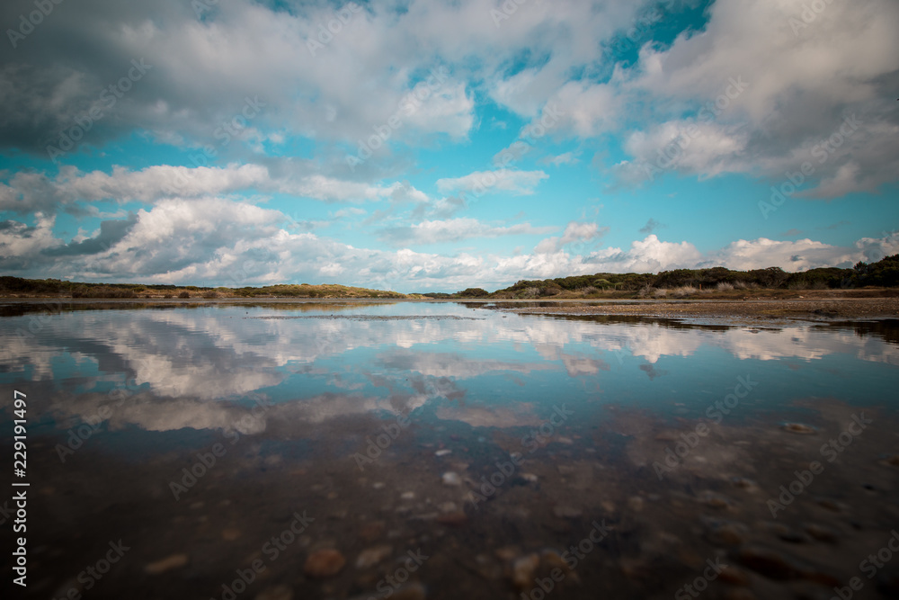 Fototapeta premium Beautiful panorama with the Mediterranean sea in Sardinia, Italy. crystal and colorful water. Beautiful sky. Travel life.