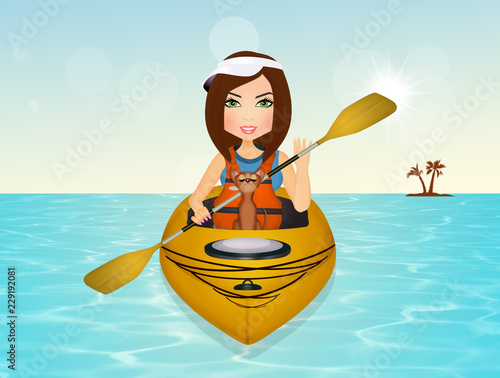 girl with her dog in the kayak