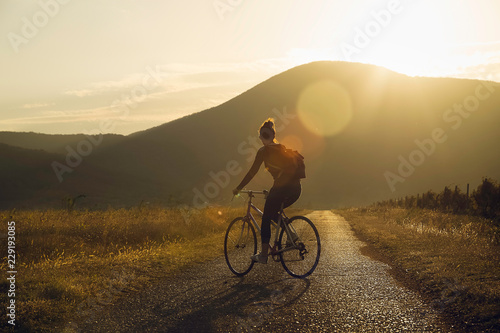 Cycling in sunset. Lifestyle concept.