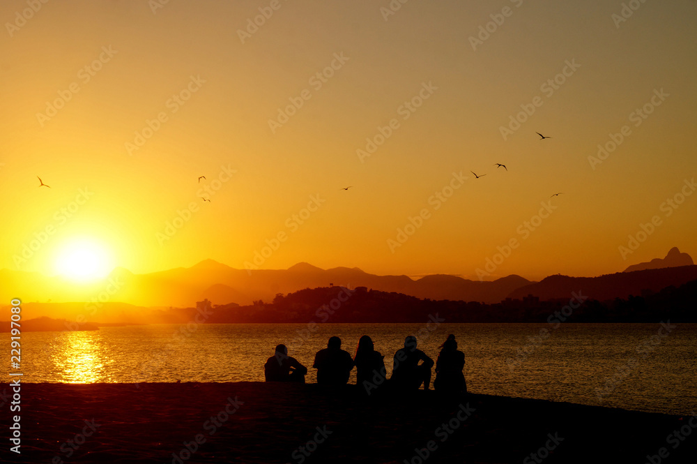 silhouette of people at sunset silhouette of people at sunset
