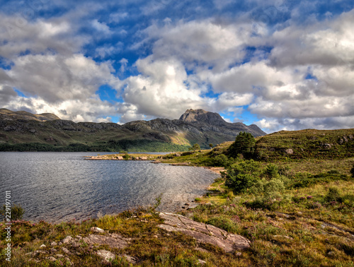 Fototapeta Naklejka Na Ścianę i Meble -  Cloudy mood in the highlands over a lake
