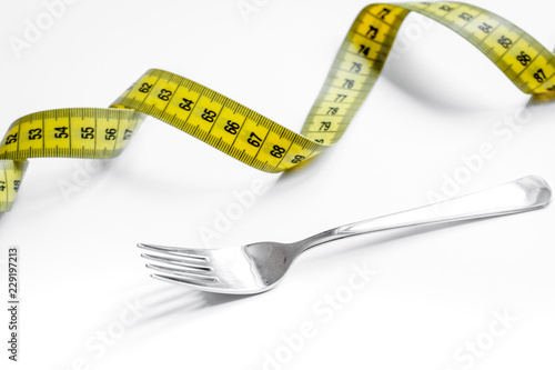 concept diet and weight loss on white background top view