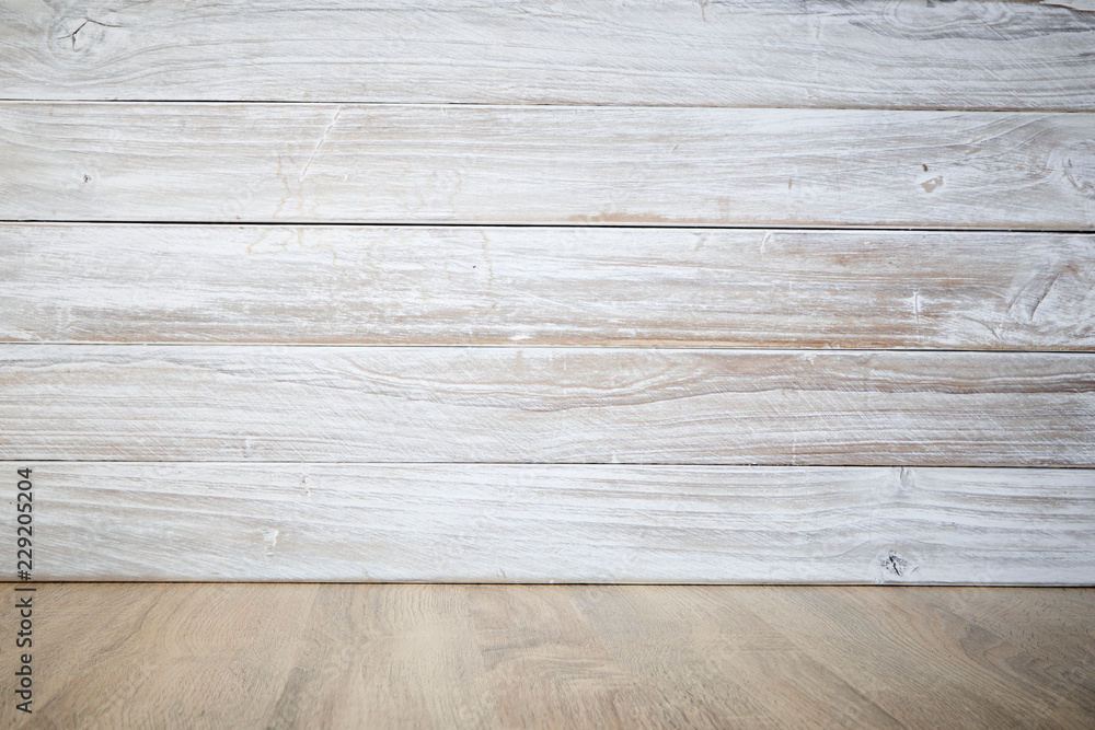 Naklejka premium wooden table with wooden wall