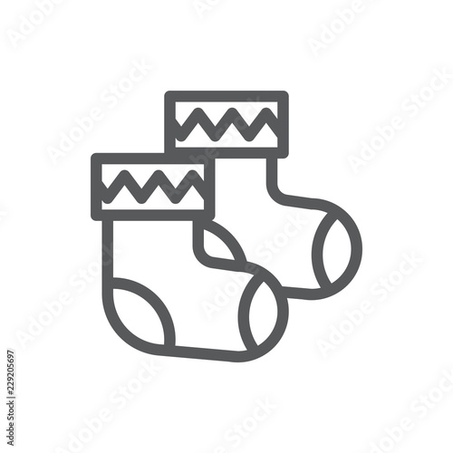 Pair of warm knitted socks with ornate pixel perfect icon with editable stroke.