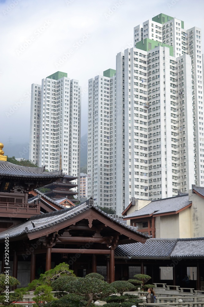 Chinese temple with skyscrapers in Nan Lian Garden, Hong Kong
