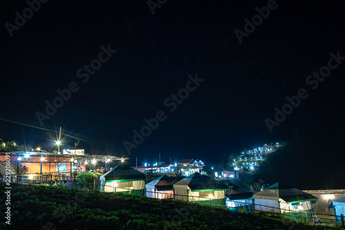 Tent and background sky and mountain views at night. © Nueng