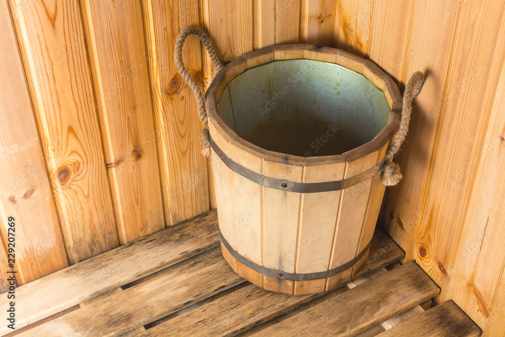 Wooden bucket for water in the bath Wooden bucket for water in the bath