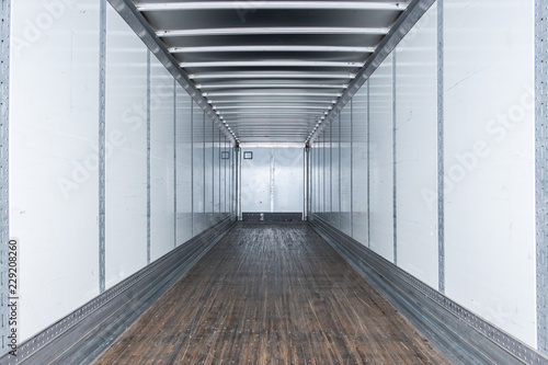 Interior view of empty semi truck dry van commercial trailer