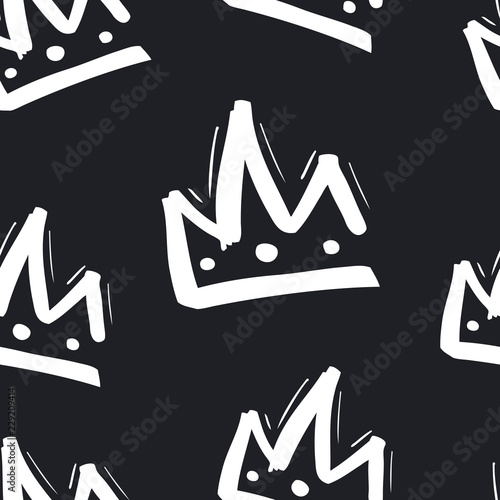 Seamless pattern with hand drawn crown on black background.