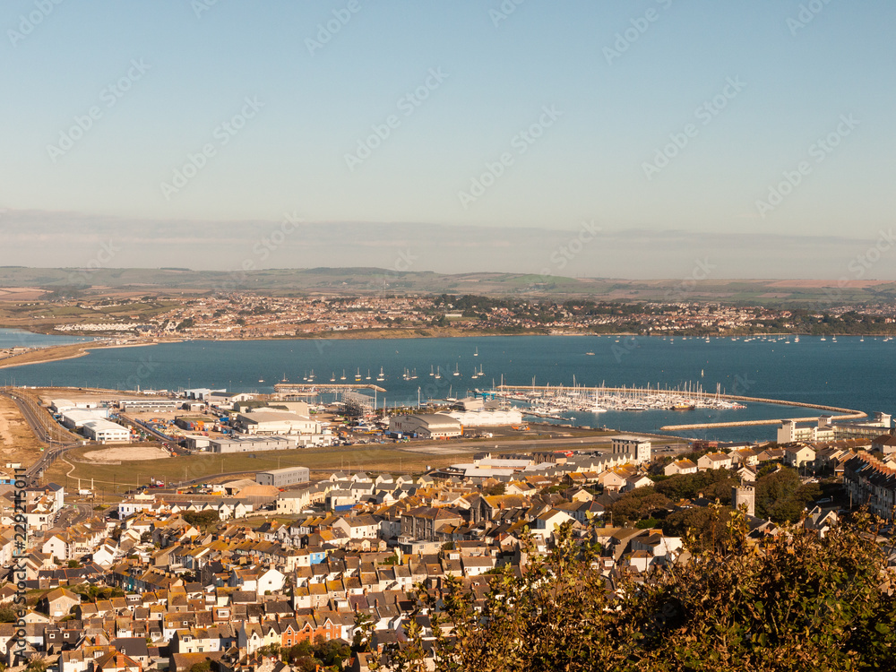 chesil beach from isle of portland beach view england summer landscape buildings