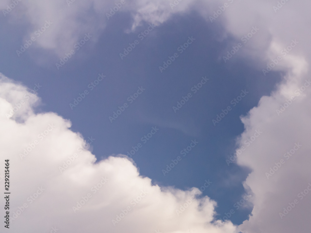 Obraz premium Beautiful white clouds in the blue sky, background, place for text.