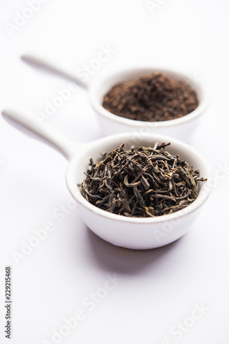 Black Tea Powder or dry dust with or without green leaf and served hot chai in a cup