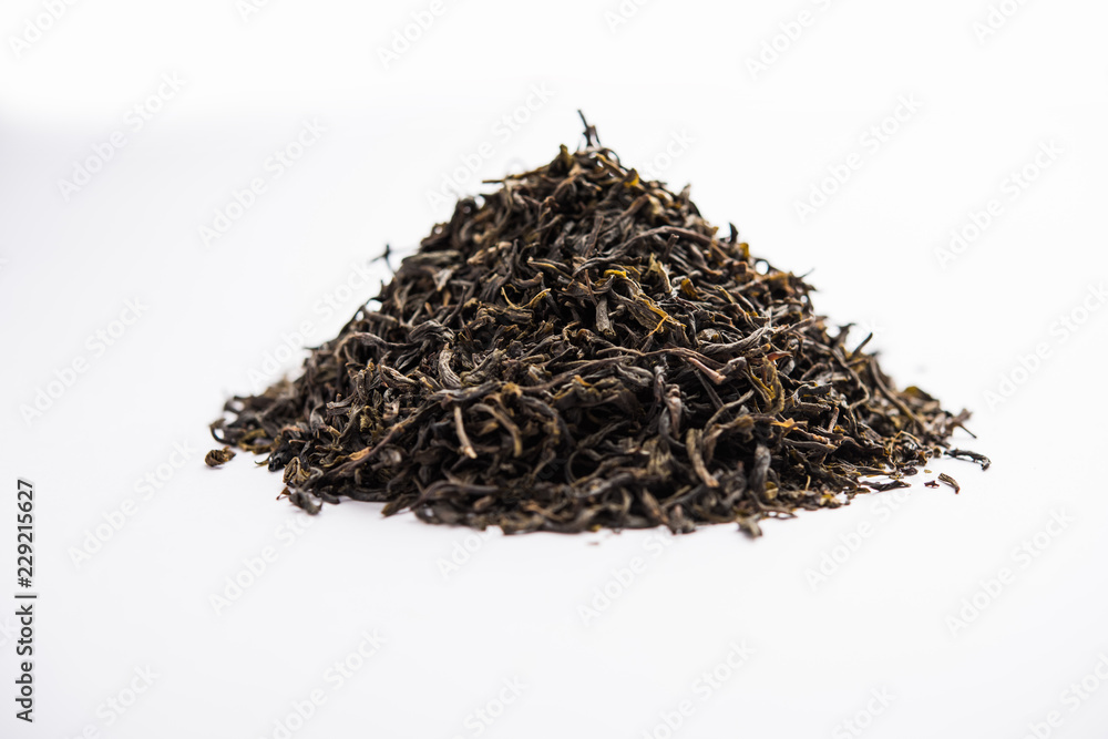 Black Tea Powder or dry dust with or without green leaf and served hot chai in a cup Black Tea Powder or dry dust with or without green leaf and served hot chai in a cup