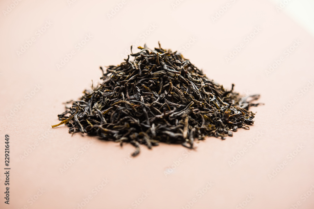 Black Tea Powder or dry dust with or without green leaf and served hot chai in a cup Black Tea Powder or dry dust with or without green leaf and served hot chai in a cup