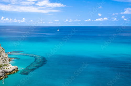 Fototapeta Naklejka Na Ścianę i Meble -  Aerial view of Tyrrhenian sea with turquoise water,Tropea, Italy