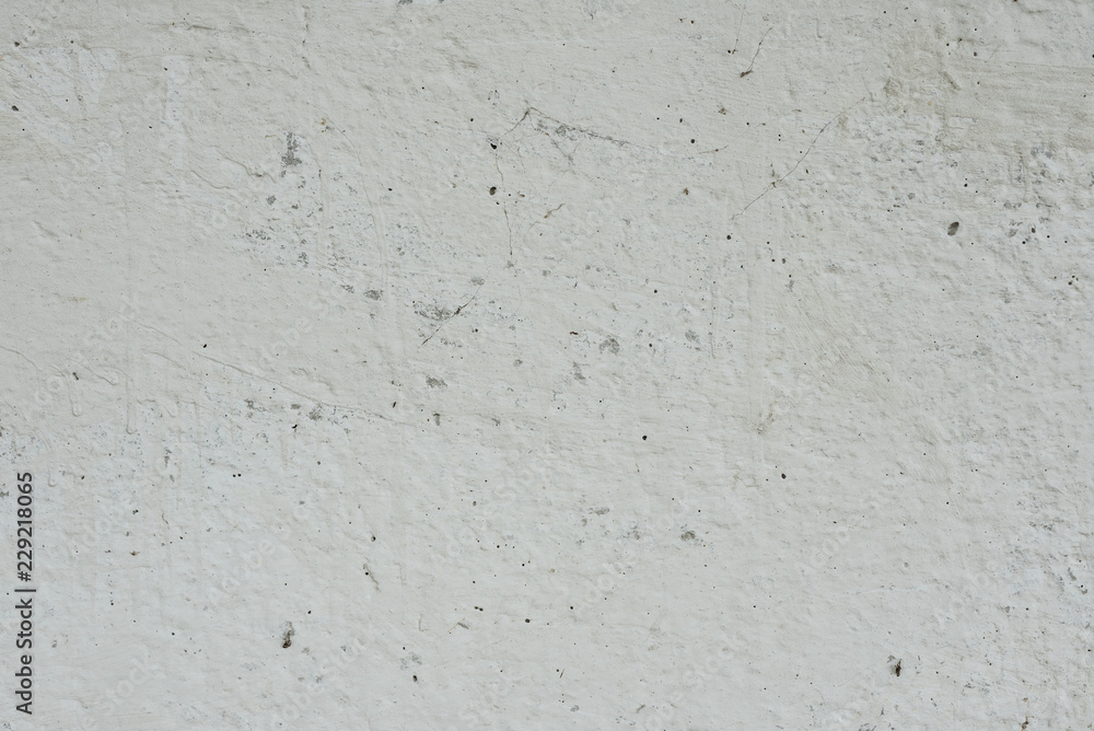 Wall fragment with scratches and cracks. It can be used as a background Wall fragment with scratches and cracks. It can be used as a background